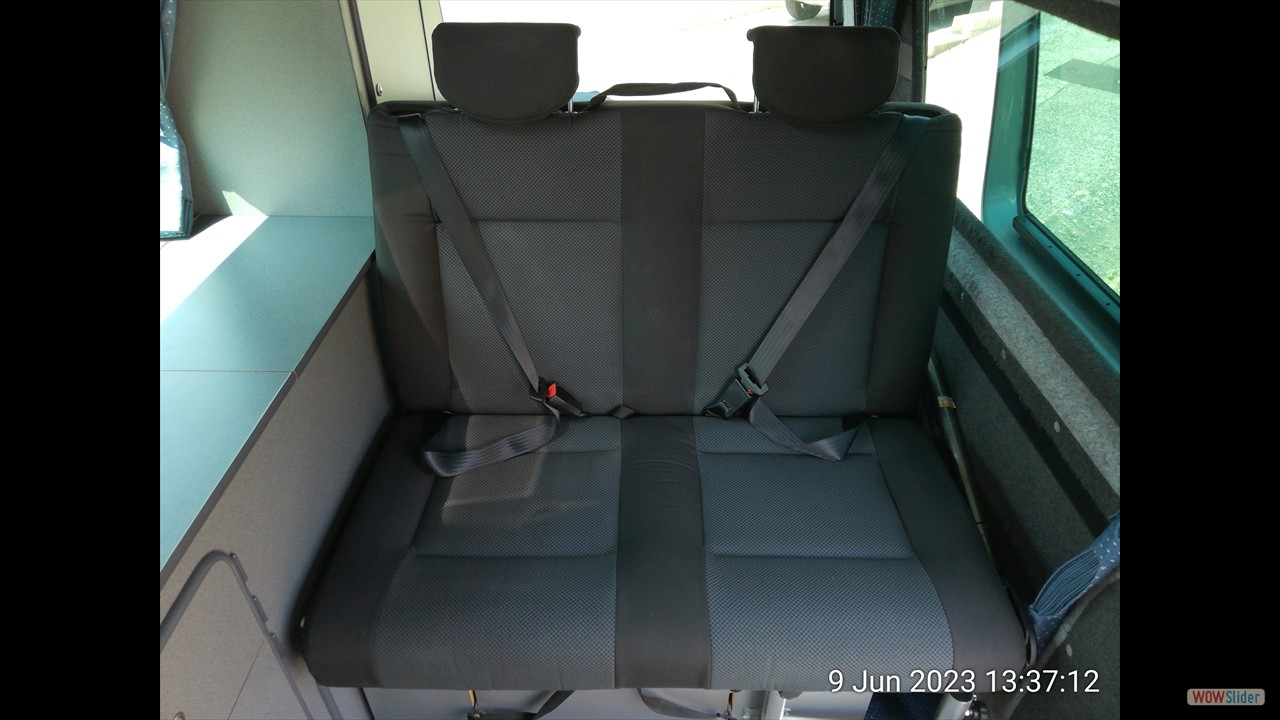Reimo rear seat with inertia belts & headrests.